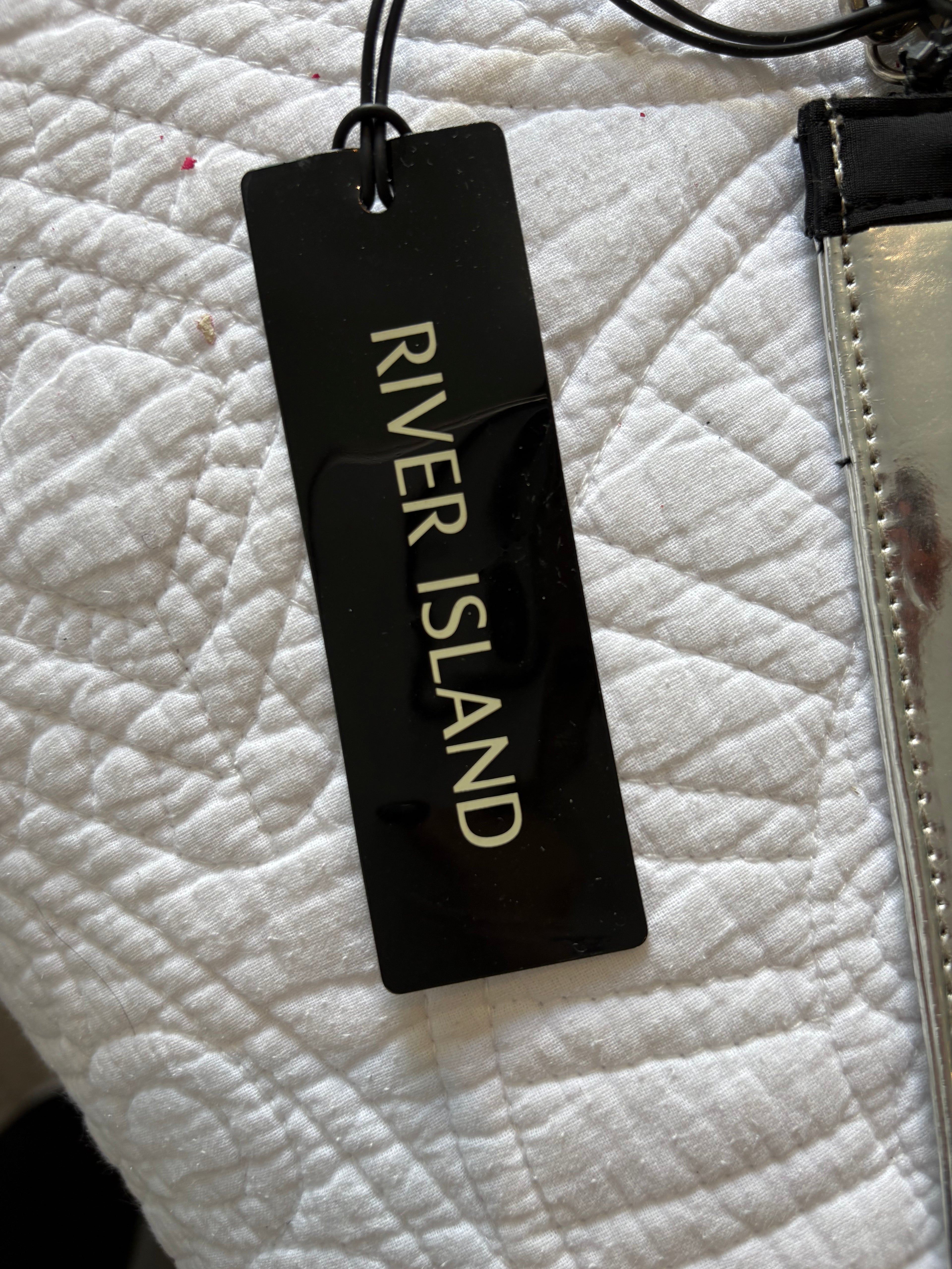 Multifabric clutch bag