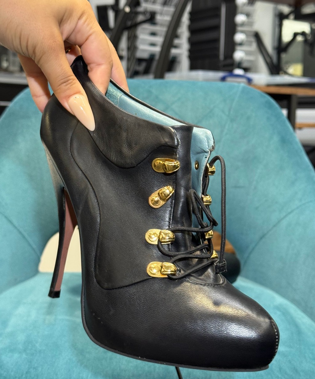 Black Leather Lace-Up Stiletto Ankle Boots with Gold Hardware